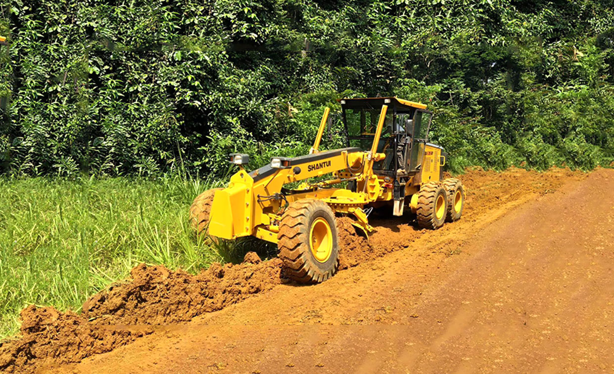 Niveleuse SG16-3 pour la construction de routes dans un camp de bûcherons en Asie du Sud-Est 